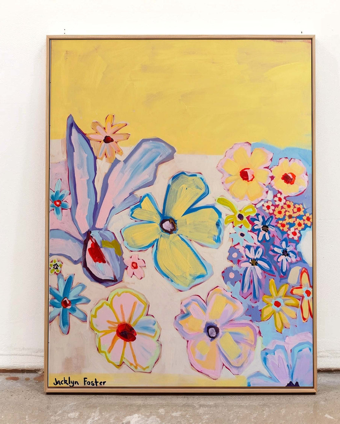 Colourful abstract painting of flowers  on a yellow background