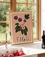 Kitchen counter with a bottle of wine, glasses, and fruit, featuring a fig fine art kitchen print