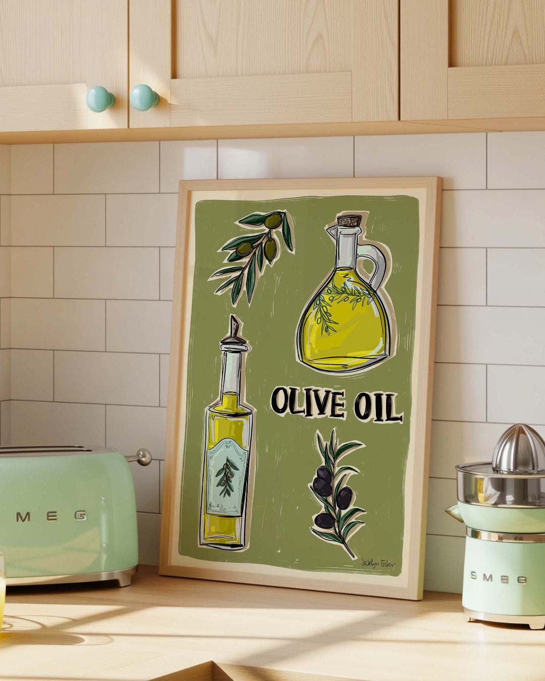 Kitchen with wooden cabinets, and a framed olive oil kitchen print.